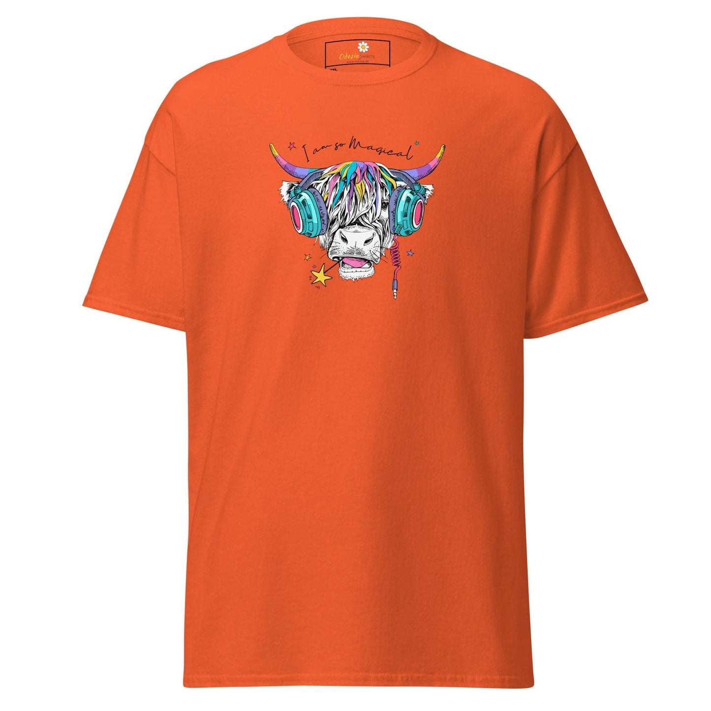 Orange t-shirt with colorful cow graphic.