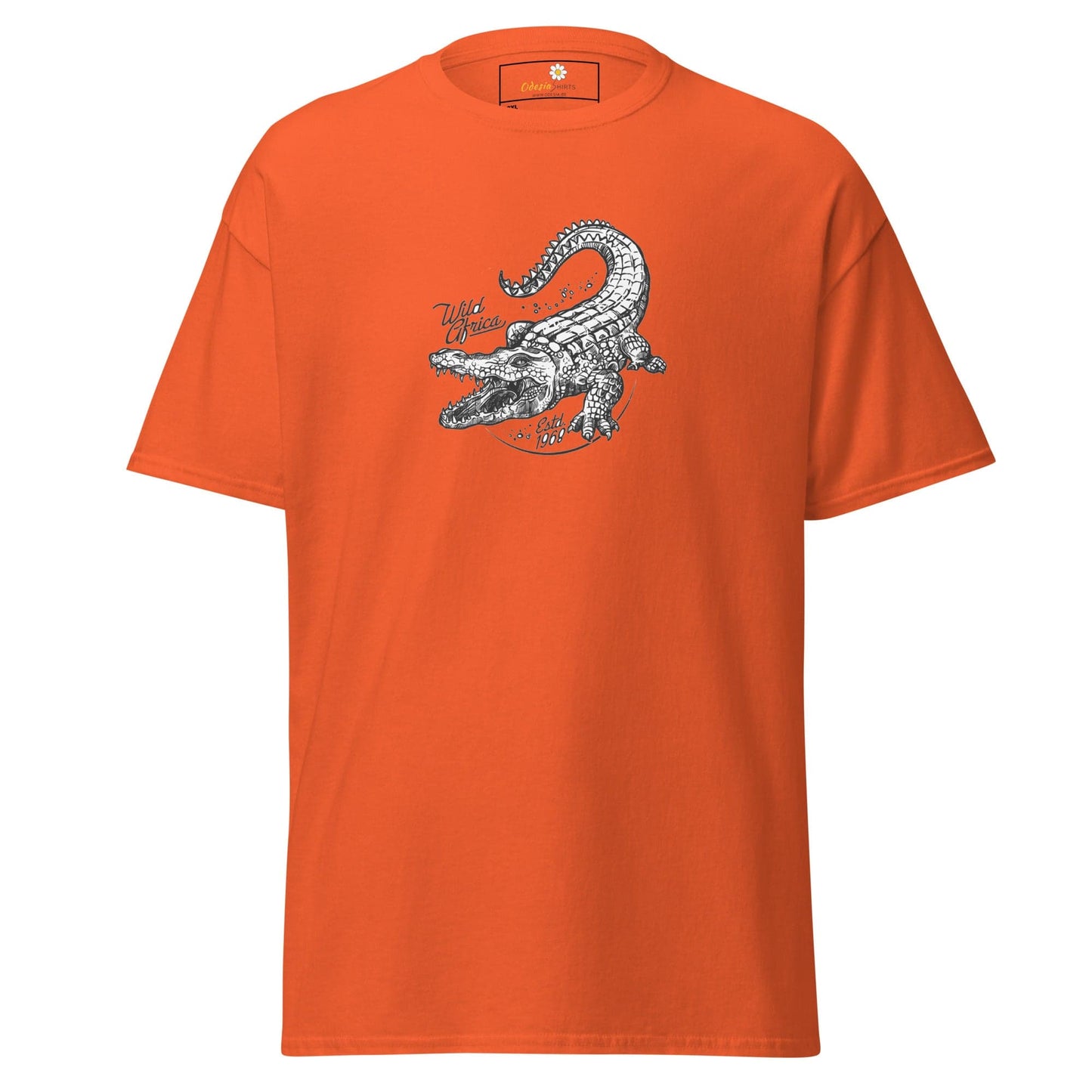 Orange t-shirt with crocodile graphic.