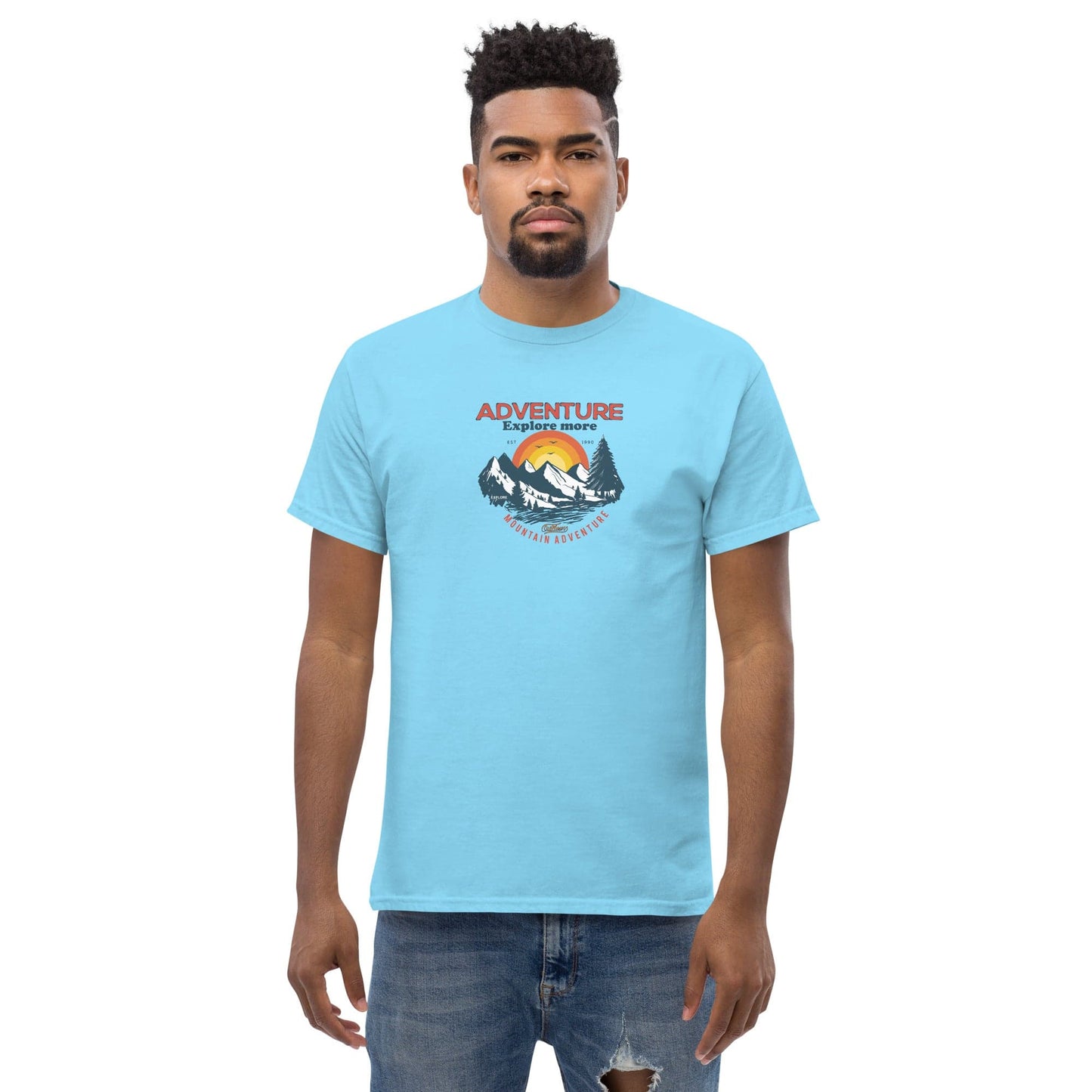 Light blue t-shirt with mountain graphic.
