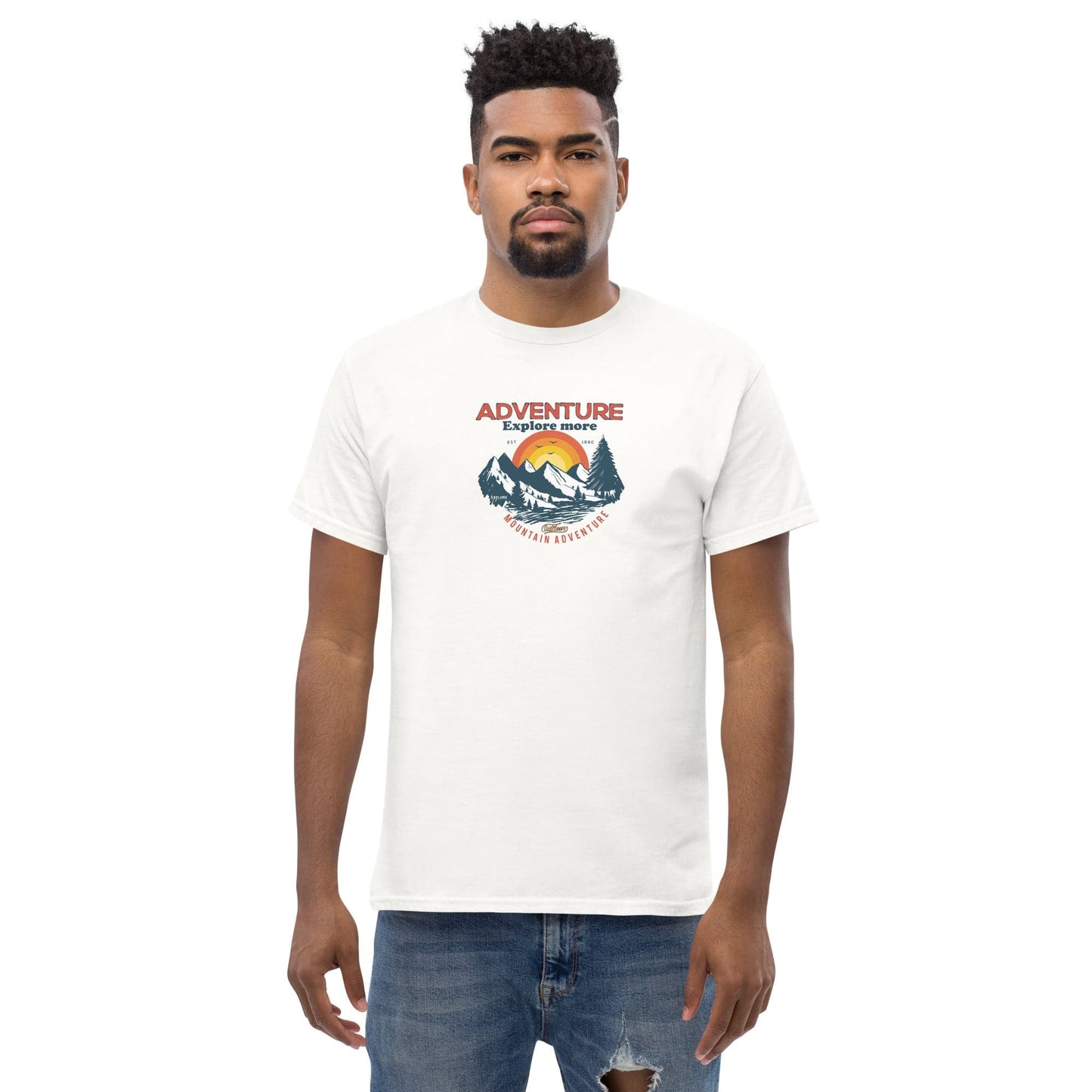 White t-shirt with adventure graphic.